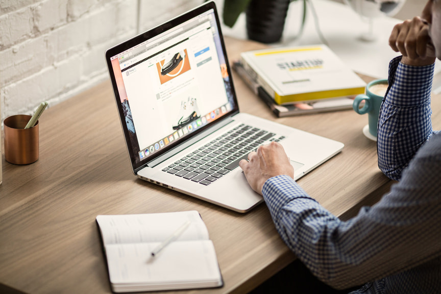 Creative work displayed on a laptop